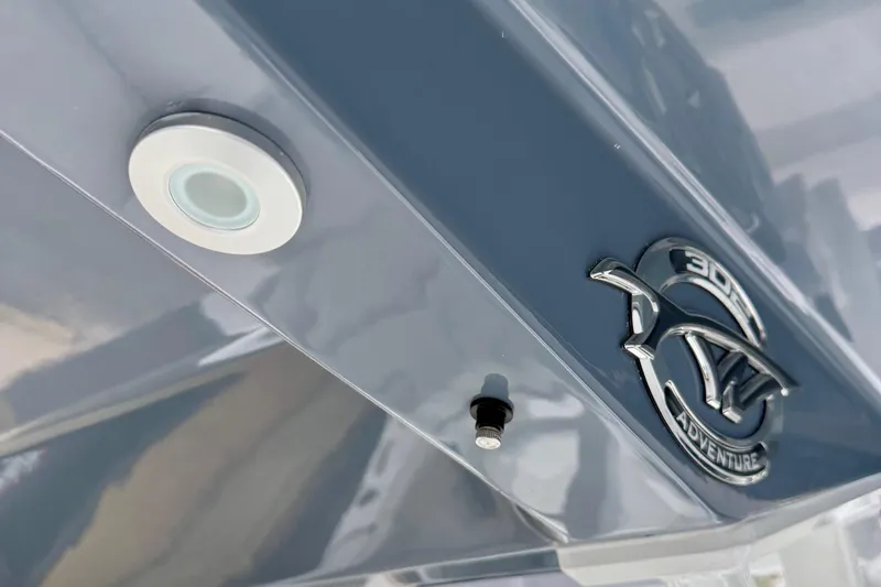 Slide: The Image of Control panel on 2026 Tidewater 302 CC Adventure boat featuring a "Mister" button. - 34