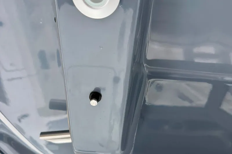 Slide: The Image of 2026 Tidewater 302 CC Adventure boat emblem and light detail. - 35