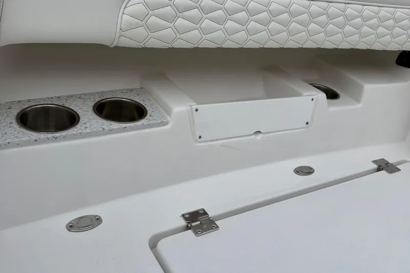 Slide: The Image of 2026 Tidewater 302 CC Adventure boat interior with white seating and modern design. - 37
