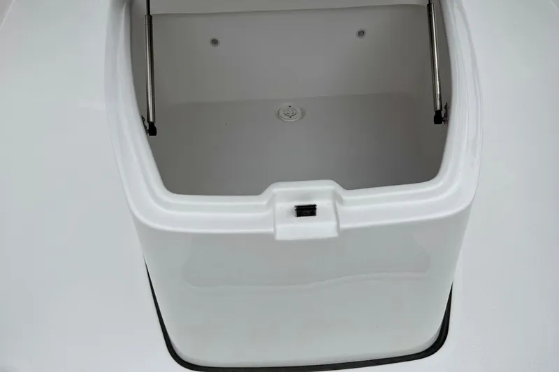 Slide: The Image of 2026 Tidewater 302 CC Adventure boat interior with cup holders and quilted seating. - 38