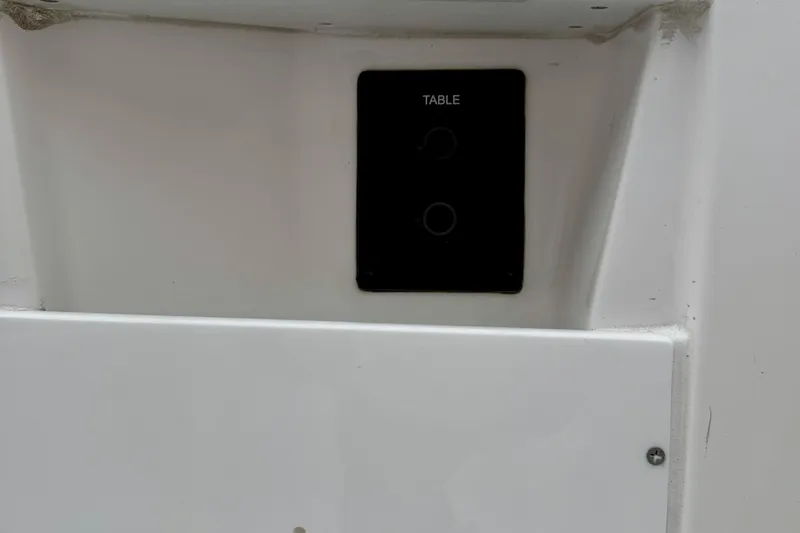 Slide: The Image of 2026 Tidewater 302 CC Adventure boat interior with speakers and quilted upholstery. - 47