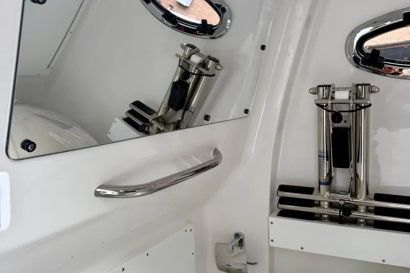 Slide: The Image of 2026 Tidewater 302 CC Adventure boat interior with modern sink and faucet. - 51