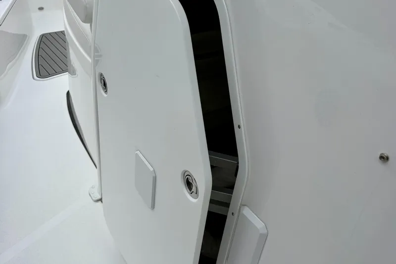 Slide: The Image of 2026 Tidewater 302 CC Adventure boat interior door detail. - 54