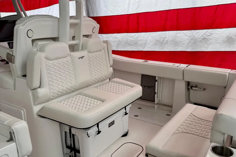 Slide: The Image of Electrical wiring and components inside a 2026 Tidewater 302 CC Adventure boat. - 57