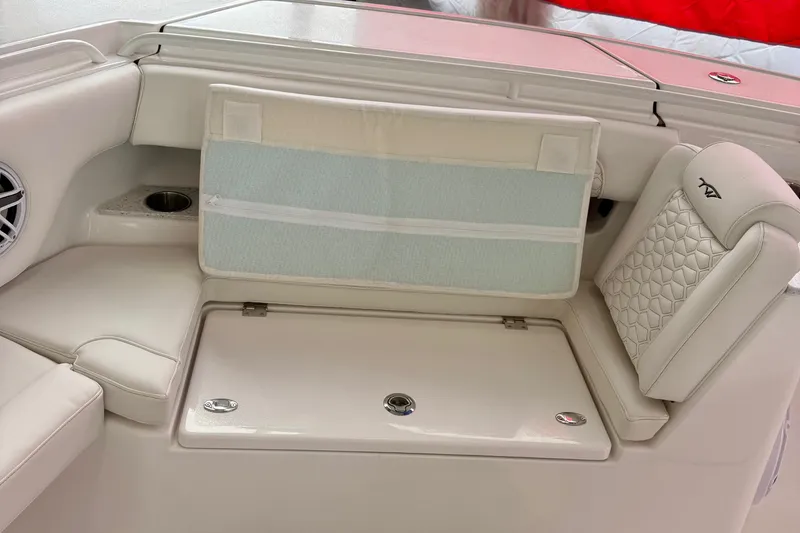 Slide: The Image of Luxurious seating on 2026 Tidewater 302 CC Adventure boat with elegant stitching design. - 62