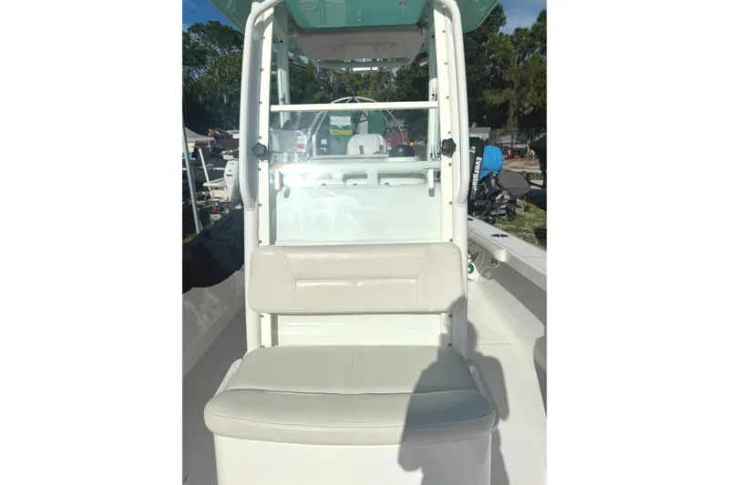 Slide: The Image of 2022 Everglades 243 Center Console boat interior with seating and console view. - 9