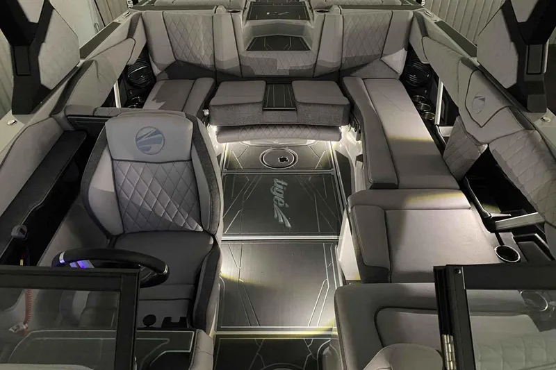 Slide: The Image of Luxurious interior of 2026 Tigé Z3 boat with modern seating and ambient lighting. - 5