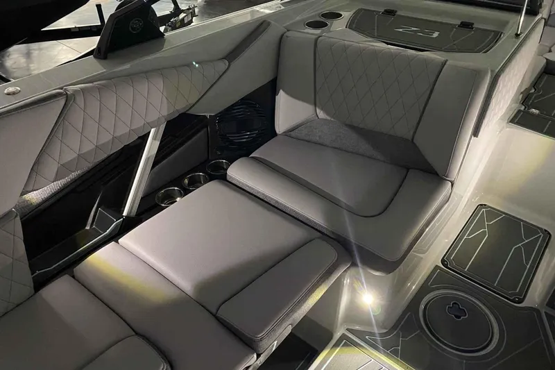 Slide: The Image of 2026 Tigé Z3 boat interior with luxurious gray seating and modern design elements. - 6