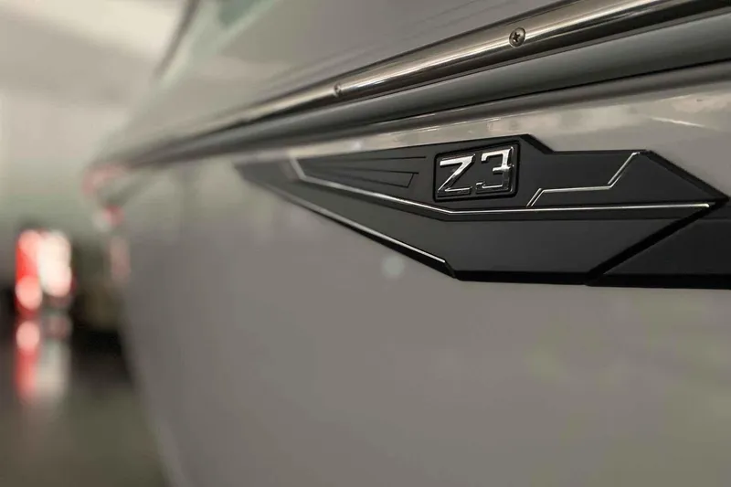 Slide: The Image of 2026 Tigé Z3 boat emblem on sleek exterior surface. - 8