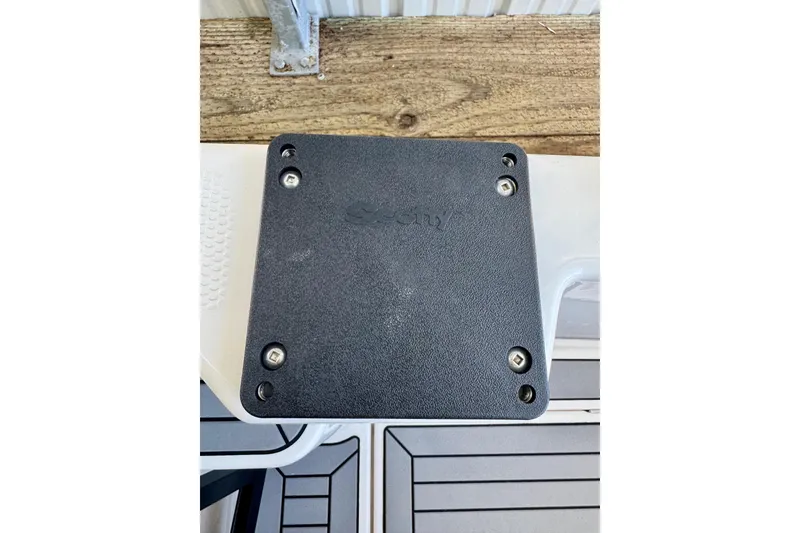 Slide: The Image of 2021 Cutwater C-24 Coupe boat deck with mounted black accessory plate. - 44