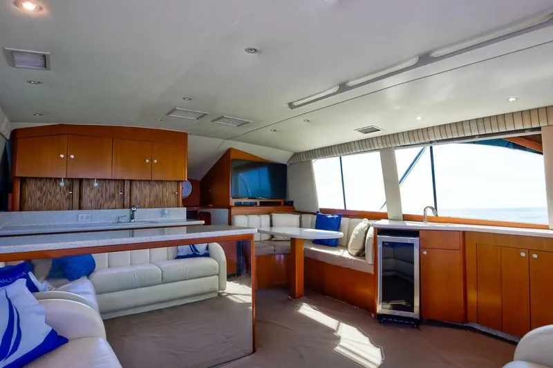 Slide: The Image of Luxurious interior of 1999 Ocean Yachts 48 Super Sport with modern furnishings and ocean view. - 8