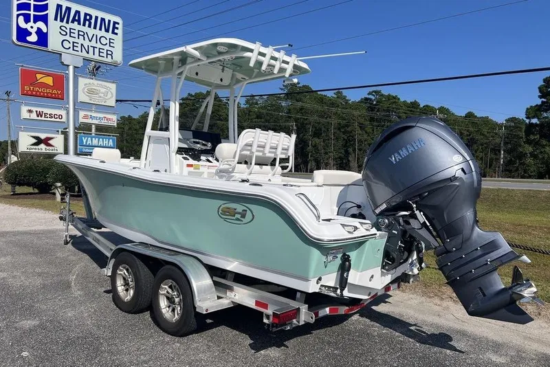 Slide: The Image of 2026 Sea Hunt Ultra 219 boat with Yamaha engine at Marine Service Center. - 9