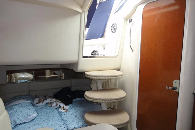 Slide: The Image of Interior cabin of 2004 Sea Ray 320 Sundancer with bed and stairs. - 20