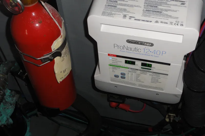 Slide: The Image of ProMariner ProNautic charger and fire extinguisher in 2004 Sea Ray 320 Sundancer boat. - 31