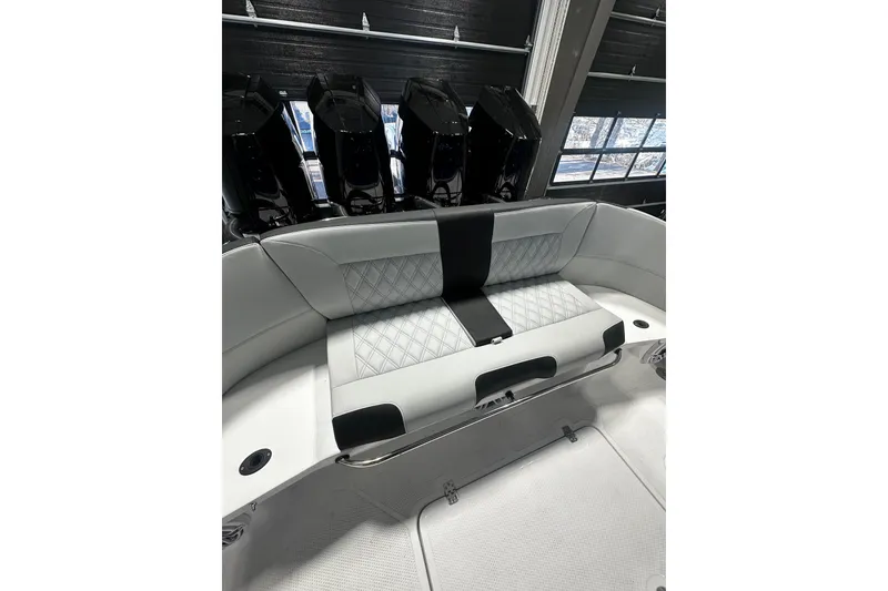 Slide: The Image of 2026 Nor-Tech 390 Sport Center Console with luxurious seating and powerful engines. - 14