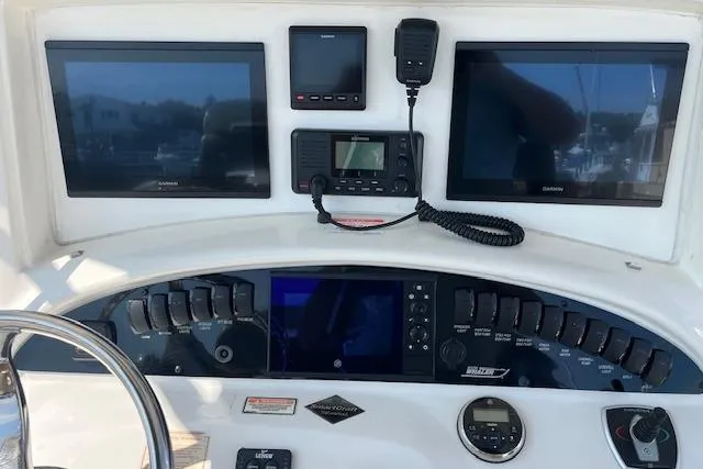 Slide: The Image of Control panel of a 2006 Boston Whaler 320 Outrage Cuddy Cabin boat. - 22