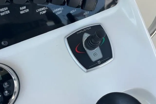 Slide: The Image of Control panel of a 2006 Boston Whaler 320 Outrage Cuddy Cabin boat. - 26