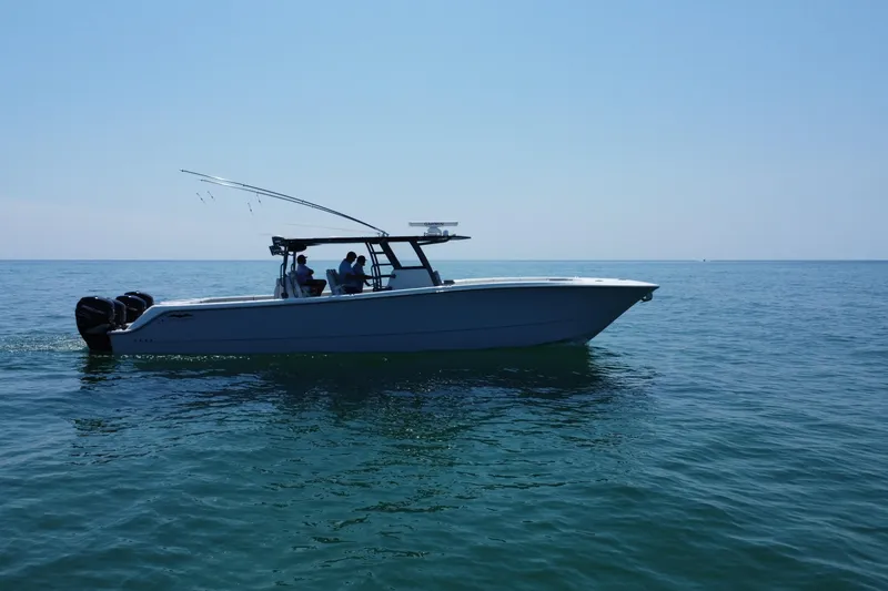 Slide: The Image of Manufacturer Provided Image: Top view layout of 2022 Invincible 46 Catamaran with labeled compartments. - 22