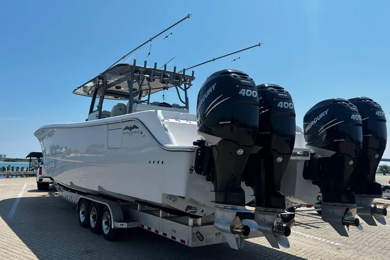 Slide: The Image of 2022 Invincible 46 Catamaran docked, showcasing sleek design and advanced features. - 27