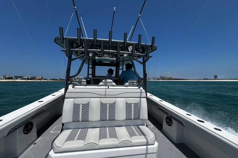 Slide: The Image of 2022 Invincible 46 Catamaran interior with sleek seating and modern speaker system. - 42