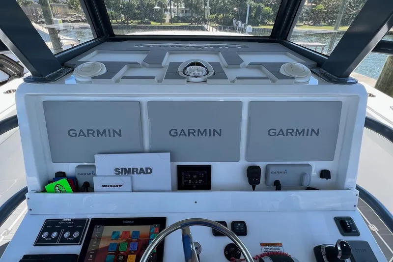 Slide: The Image of Invincible 46 Catamaran 2022 docked, showcasing spacious seating and modern design. - 53