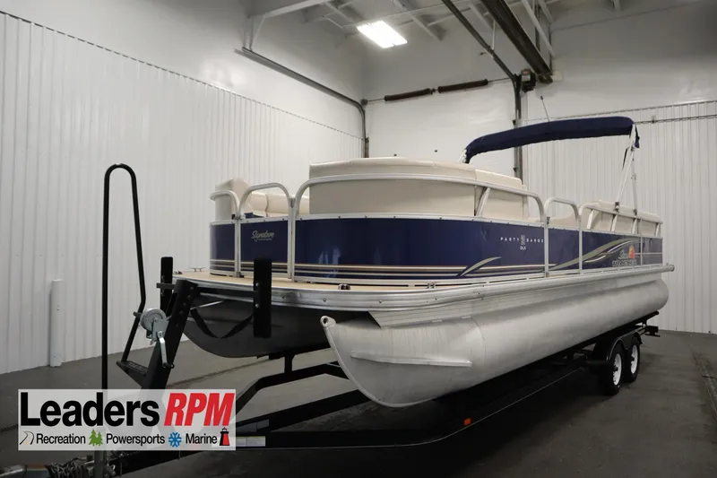 The Image of 2014 Sun Tracker Party Barge 24 DLX pontoon boat in indoor storage. - 0