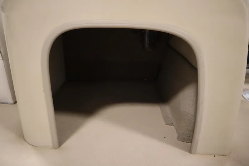 Slide: The Image of 2014 Sun Tracker Party Barge 24 DLX storage compartment, beige interior. - 16