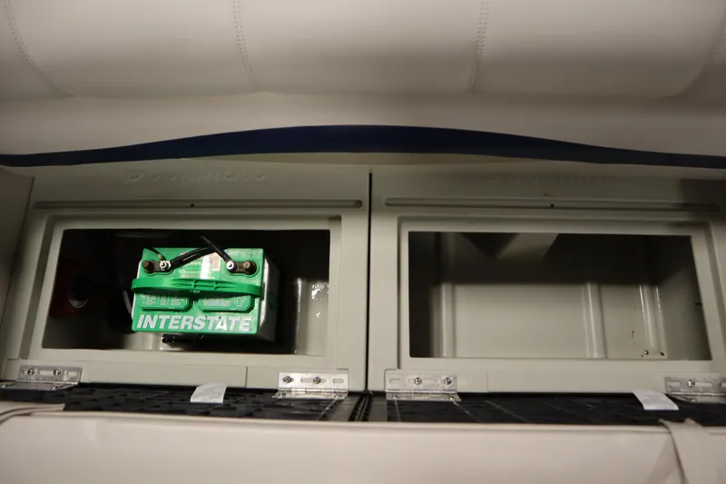 Slide: The Image of Battery compartment of 2014 Sun Tracker Party Barge 24 DLX with Interstate battery. - 26