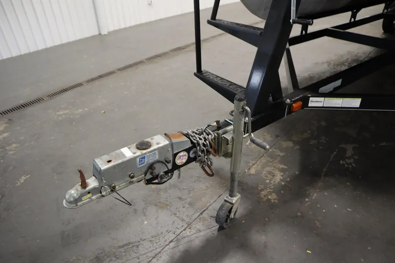 Slide: The Image of Trailer hitch of 2014 Sun Tracker Party Barge 24 DLX in a garage setting. - 35