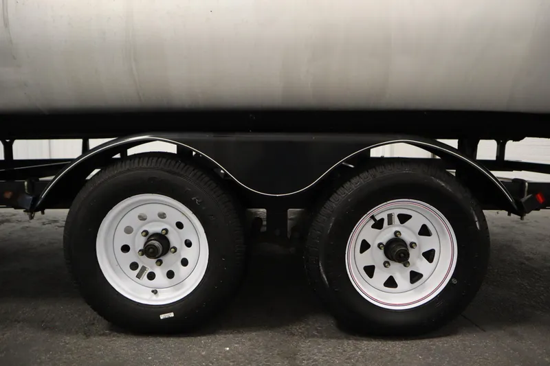 Slide: The Image of Trailer wheels of a 2014 Sun Tracker Party Barge 24 DLX pontoon boat. - 38