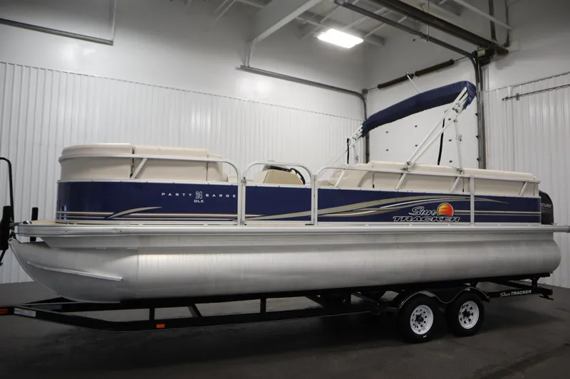 Slide: The Image of 2014 Sun Tracker Party Barge 24 DLX pontoon boat in indoor storage. - 7