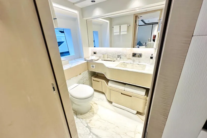 Slide: The Image of Luxurious bathroom in 2023 Majesty 120 yacht with marble accents and modern fixtures. - 28