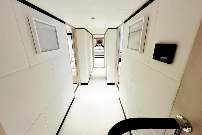 Slide: The Image of Luxurious hallway interior of 2023 Majesty 120 yacht, featuring modern design and elegant decor. - 38