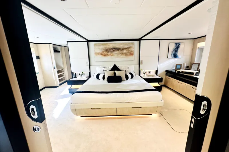 Slide: The Image of Luxurious 2023 Majesty 120 yacht bedroom with modern decor and elegant furnishings. - 49