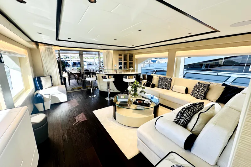 Slide: The Image of Luxurious interior of 2023 Majesty 120 yacht with elegant seating and modern decor. - 8