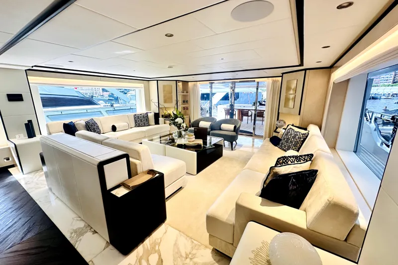 Slide: The Image of Luxurious interior of 2023 Majesty 120 yacht with elegant seating and modern decor. - 9