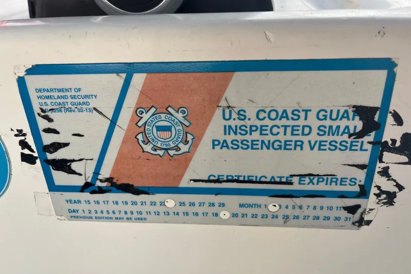 Slide: The Image of U.S. Coast Guard inspection sticker on 2023 Maurell Pontoon vessel. - 8