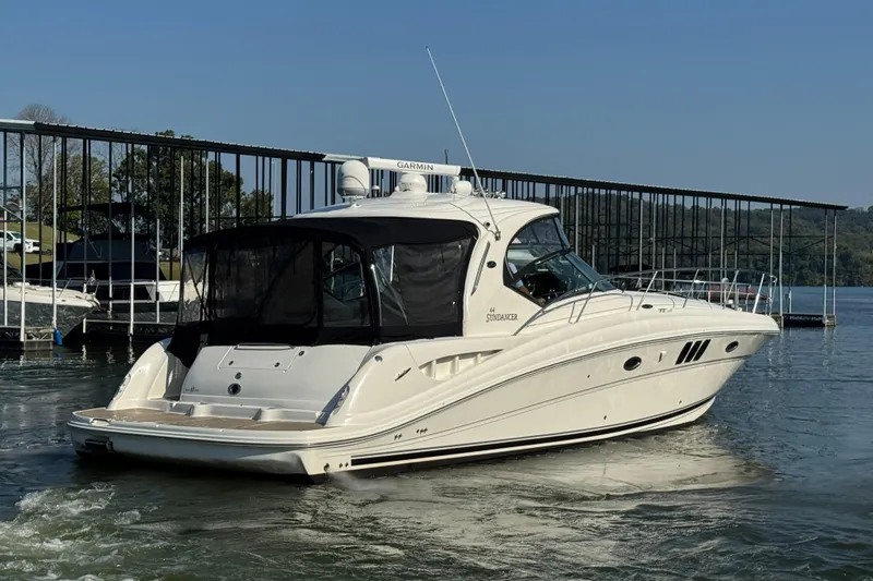 Slide: The Image of 2008 Sea Ray 44 Sundancer yacht docked on a sunny day. - 2