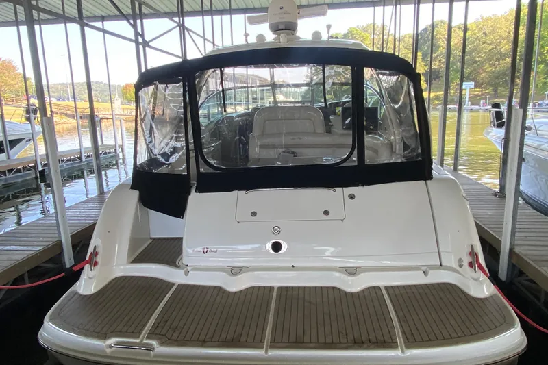 Slide: The Image of 2008 Sea Ray 44 Sundancer yacht docked in marina, rear view. - 4