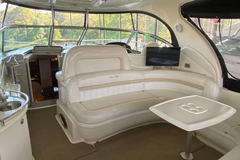Slide: The Image of Luxurious interior of 2008 Sea Ray 44 Sundancer yacht with plush seating and modern amenities. - 5