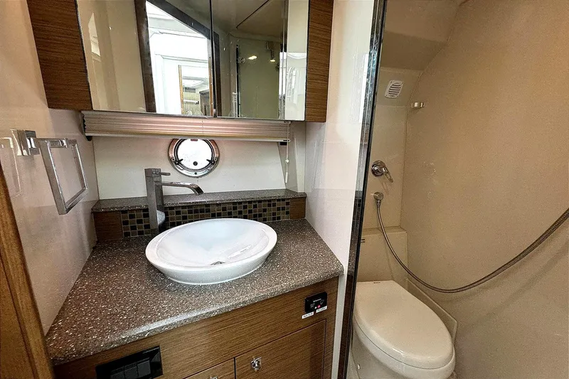 Slide: The Image of Luxurious bathroom in 2014 Cruisers Yachts 45 Cantius with modern fixtures and elegant design. - 19