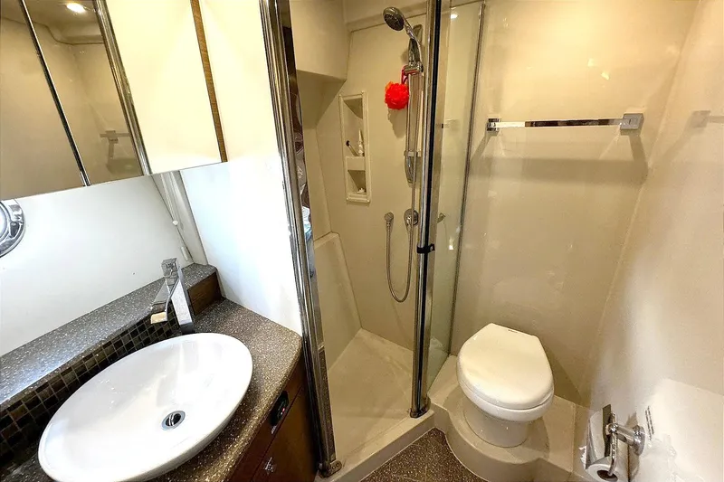 Slide: The Image of Luxurious bathroom in 2014 Cruisers Yachts 45 Cantius with modern fixtures and glass shower. - 20