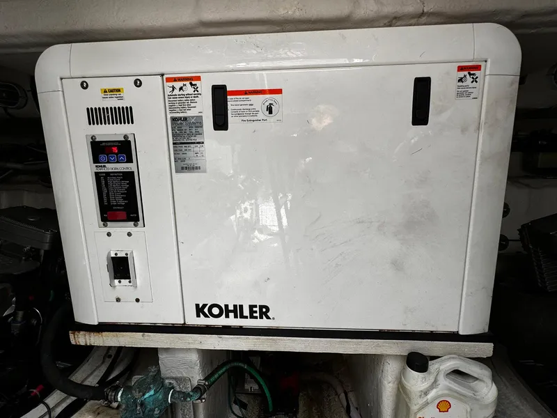 Slide: The Image of Kohler generator in 2014 Cruisers Yachts 45 Cantius engine room. - 24