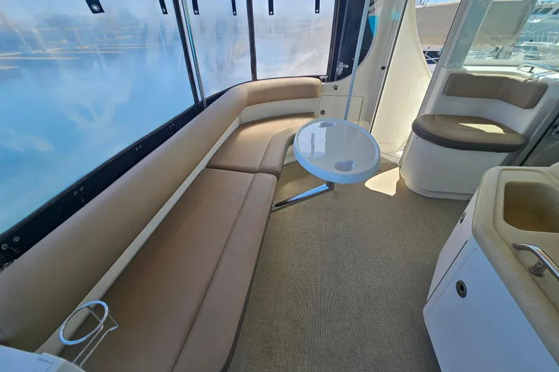 Slide: The Image of Interior of 2005 Sea Ray 390 Motor Yacht with seating and table. - 15