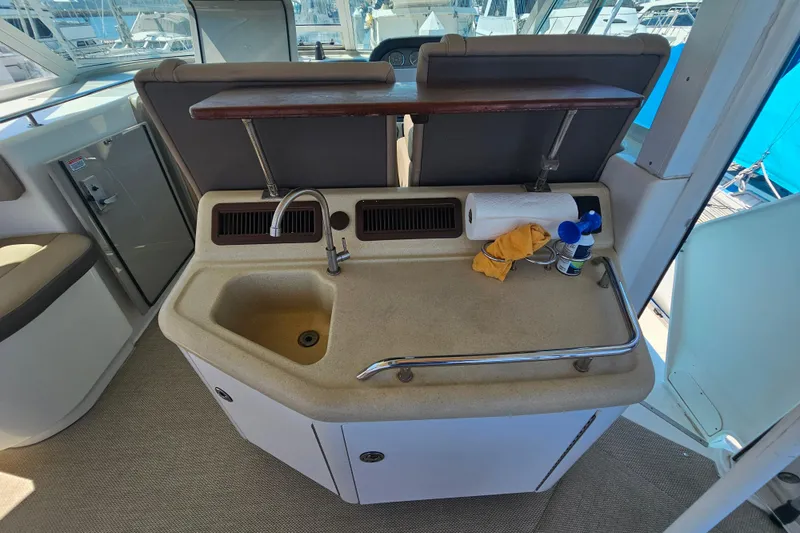 Slide: The Image of 2005 Sea Ray 390 Motor Yacht interior with sink and counter space. - 19
