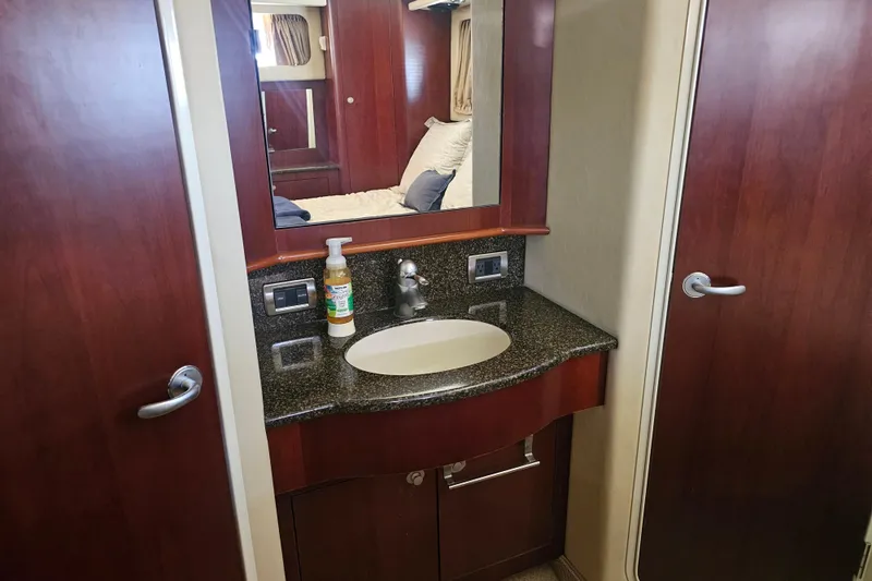 Slide: The Image of Luxurious bathroom in 2005 Sea Ray 390 Motor Yacht with elegant wood cabinetry. - 43