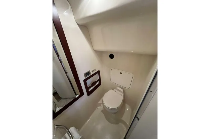 Slide: The Image of Bathroom interior of 2005 Sea Ray 390 Motor Yacht, featuring compact design and modern amenities. - 45