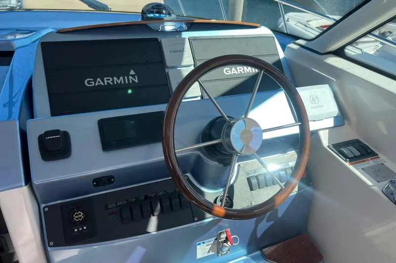 Slide: The Image of Helm of 2014 Tiara Yachts 3900 Coronet with Garmin navigation system. - 19