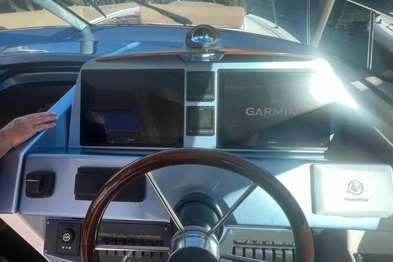 Slide: The Image of Helm of 2014 Tiara Yachts 3900 Coronet with Garmin navigation displays and VesselView system. - 22