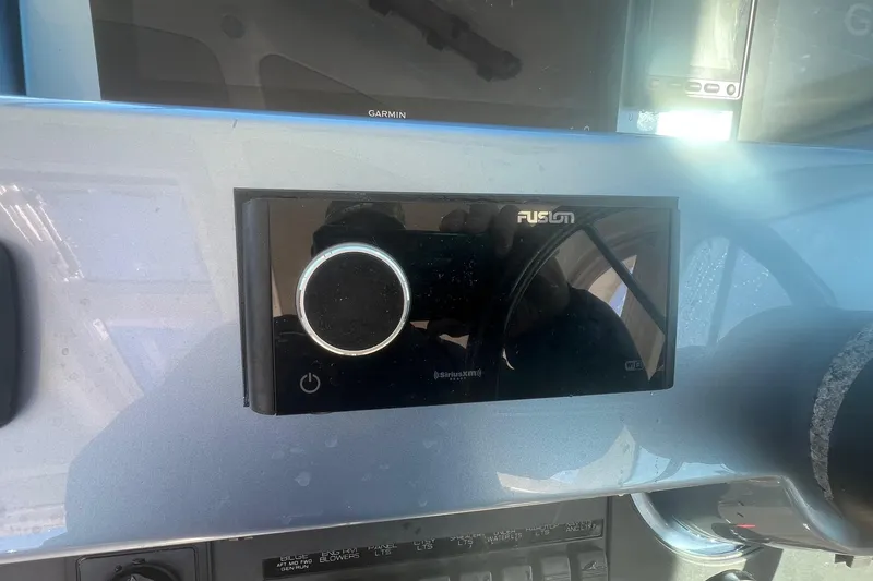 Slide: The Image of Control panel of a 2014 Tiara Yachts 3900 Coronet with Fusion audio system. - 24